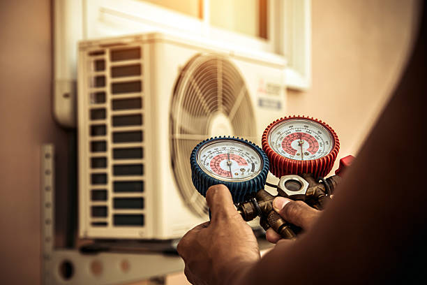 Professional Heat Pump Repair technician working in Weston, FL
